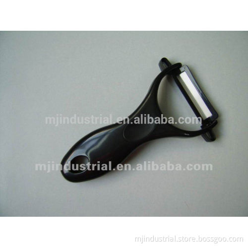 Kitchen Peeler with white ceramic cutting blade and ABS handle
